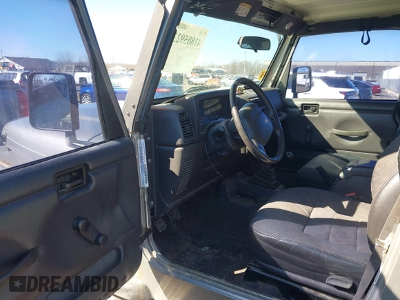 2002 Jeep Wrangler Sport with VIN 1J4FA49SX2P732367, listed as a IAAI auction lot 41805923 with 204,757 mi miles. Bid and sale history available at carsss.com. Image 5.