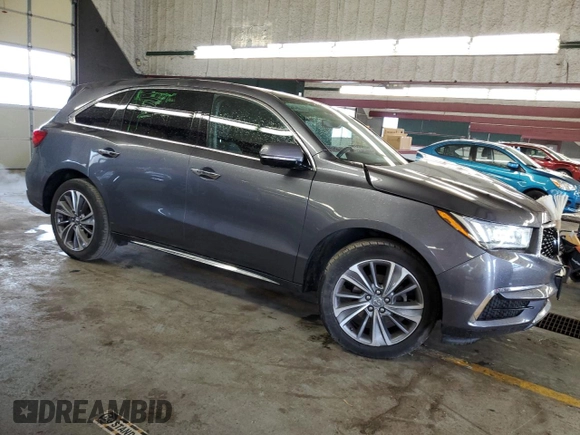 2018 Acura MDX Technology с VIN 5J8YD4H57JL016129, выставлен на аукционе Copart как лот 58921365 с пробегом 99 051 миль миль и Списание • Salvage title. История ставок и продаж доступна на DreamBid. Изображение 4.