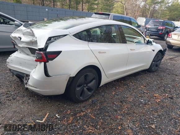 2020 Tesla Model 3 Long Range with VIN 5YJ3E1EB6LF618931, listed as a IAAI auction lot 41867451 with 47,502 mi miles and . Bid and sale history available at DreamBid. Image 4.