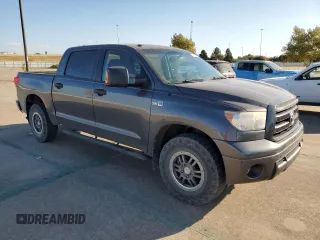 2012 Toyota Tundra 4WD Truck with VIN 5TFDW5F10CX233367, listed as a Copart auction lot 77144064 with 199,361 mi miles and Salvage Title. Bid and sale history available at carsss.com. Image 4.
