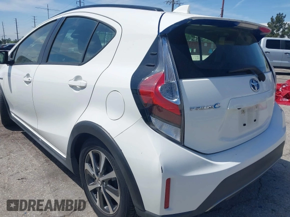 2018 Toyota Prius One with VIN JTDKDTB33J1613019, listed as a IAAI auction lot 42063768 with 59,143 mi miles and . Bid and sale history available at DreamBid. Image 6.