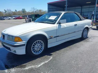 1996 BMW 3-Series 328IC with VIN WBABK8324TET92418, listed as a IAAI auction lot 41815664 with 128,661 mi miles. Bid and sale history available at carsss.com. Image 2.