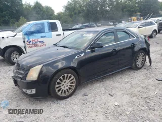 2011 Cadillac CTS Performance with VIN 1G6DJ5EYXB0131999, listed as a Copart auction lot 65033465 with 140,484 mi miles and Salvage title. Bid and sale history available at DreamBid. Image 1.
