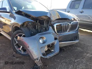 2017 BMW X1 sDrive28i with VIN WBXHU7C30H5H32753, listed as a IAAI auction lot 41441791 with 100,072 mi miles. Bid and sale history available at carsss.com. Image 6.