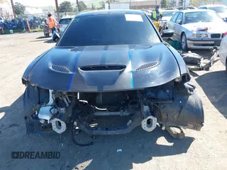 2017 Dodge Charger SRT Hellcat z VIN 2C3CDXL90HH509733, wystawiony jako IAAI lot #39143116 z przebiegiem Nie podano mil oraz . Historia ofert i sprzedaży dostępna na DreamBid. Obrazek 12.