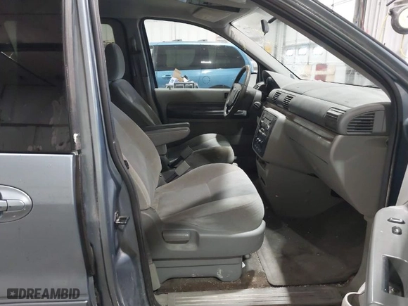 2005 Ford Freestar Wagon SEL with VIN 2FMZA52265BA19556, listed as a IAAI auction lot 41409009 with 259,346 mi miles. Bid and sale history available at carsss.com. Image 5.