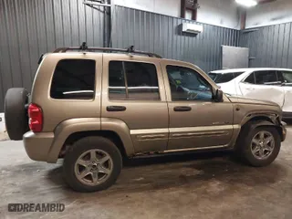 2003 Jeep Liberty Limited with VIN 1J4GL58K73W633356, listed as a IAAI auction lot 41585605 with 152,373 mi miles. Bid and sale history available at carsss.com. Image 14.