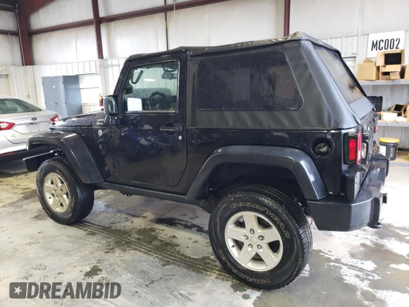 2013 Jeep Wrangler Rubicon with VIN 1C4BJWCG1DL584611, listed as a Copart auction lot 71536944 with 142,975 mi miles and Salvage title. Bid and sale history available at DreamBid. Image 2.