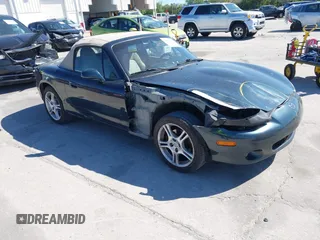 2005 Mazda MX-5 Miata Cloth z VIN JM1NB353950414261, wystawiony jako IAAI lot #41802814 z przebiegiem 182 169 mil mil oraz . Historia ofert i sprzedaży dostępna na DreamBid. Obrazek 1.