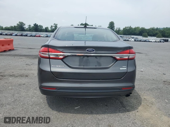 2017 Ford Fusion SE z VIN 3FA6P0HD7HR249569, wystawiony jako Copart lot #63072895 z przebiegiem 154 607 mil mil oraz Szkoda całkowita • Salvage title. Historia ofert i sprzedaży dostępna na DreamBid. Obrazek 6.