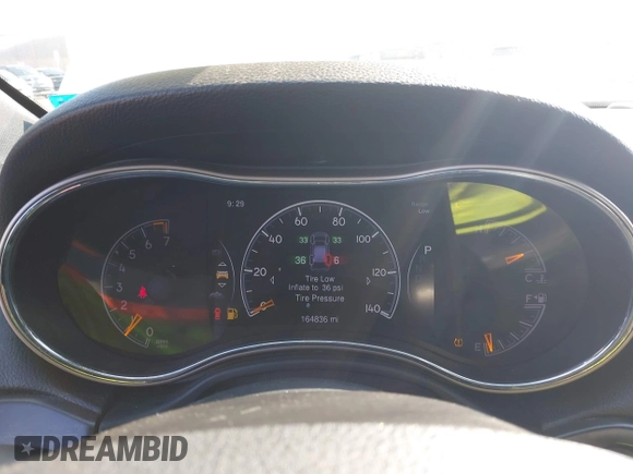 2014 Jeep Grand Cherokee Limited with VIN 1C4RJFBG9EC302183, listed as a IAAI auction lot 42635630 with 164,836 mi miles and . Bid and sale history available at DreamBid. Image 7.