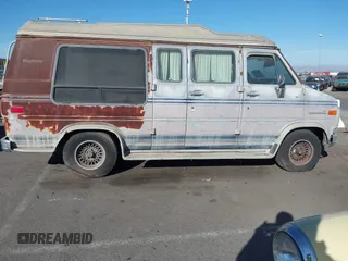 1989 GMC Vandura z VIN 1GDEG25K1K7521984, wystawiony jako IAAI lot #41371811 z przebiegiem 43 502 mil mil oraz . Historia ofert i sprzedaży dostępna na DreamBid. Obrazek 12.