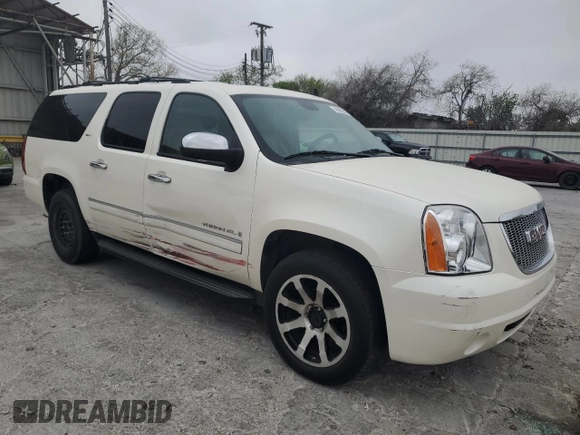 2009 GMC Yukon XL SLT w/4SB with VIN 1GKFC36J39R178579, listed as a Copart auction lot 49693945 with 209,135 mi miles and Salvage Title. Bid and sale history available at carsss.com. Image 4.