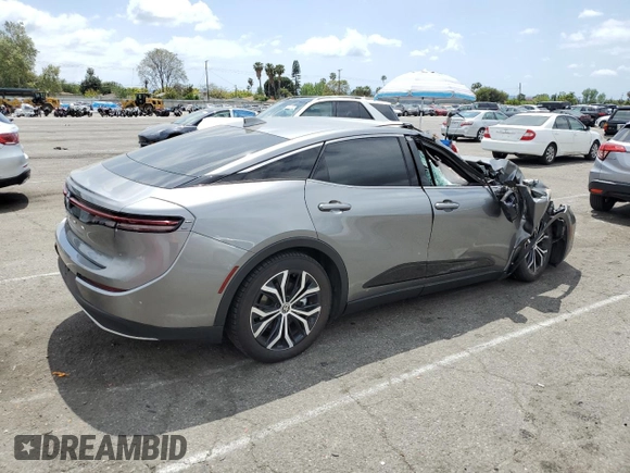 2024 Toyota Crown XLE with VIN JTDAAAAF3R3028736, listed as a Copart auction lot 50544405 with 52,117 mi miles and Salvage title. Bid and sale history available at DreamBid. Image 3.