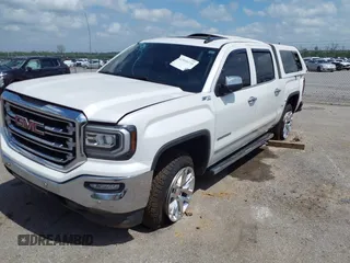 2018 GMC Sierra 1500 SLT z VIN 3GTU2NEC9JG240754, wystawiony jako IAAI lot #41890229 z przebiegiem 183 966 mil mil oraz . Historia ofert i sprzedaży dostępna na DreamBid. Obrazek 2.