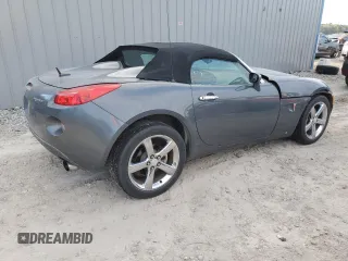 2009 Pontiac Solstice z VIN 1G2MN35B69Y105093, wystawiony jako Copart lot #72854034 z przebiegiem 82 333 mil mil oraz Szkoda całkowita • Salvage title. Historia ofert i sprzedaży dostępna na DreamBid. Obrazek 3.