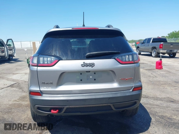 2020 Jeep Cherokee Trailhawk z VIN 1C4PJMBX1LD590087, wystawiony jako IAAI lot #42027620 z przebiegiem 91 033 mil mil oraz . Historia ofert i sprzedaży dostępna na DreamBid. Obrazek 16.