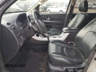 2005 Mercury Mariner Luxury with VIN 4M2YU57115DJ23819, listed as a Copart auction lot 54370265 with 215,657 mi miles and Clean title. Bid and sale history available at DreamBid. Image 7.