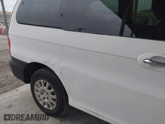 2003 Kia Sedona LX with VIN KNDUP131536402900, listed as a IAAI auction lot 41500260 with 143,825 mi miles and . Bid and sale history available at DreamBid. Image 14.