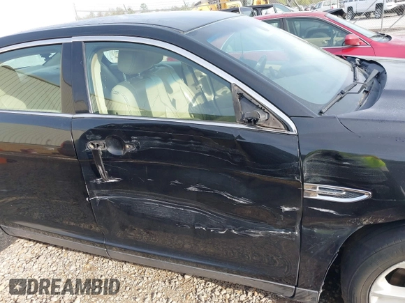 2013 Ford Taurus SEL with VIN 1FAHP2E83DG139440, listed as a IAAI auction lot 41887873 with 251,062 mi miles and . Bid and sale history available at carsss.com. Image 6.