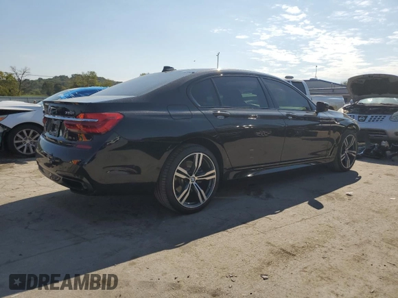 2019 BMW 7 Series 750i with VIN WBA7F0C56KGM25329, listed as a Copart auction lot 71613623 with 52,799 mi miles. Bid and sale history available at carsss.com. Image 3.
