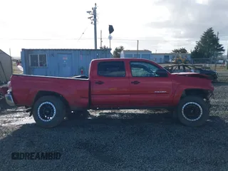 2015 Toyota Tacoma with VIN 3TMMU4FN1FM077045, listed as a IAAI auction lot 41670552 with 118,983 mi miles and . Bid and sale history available at DreamBid. Image 14.
