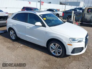 2018 Audi Q3 Premium with VIN WA1BCCFS8JR001155, listed as a IAAI auction lot 41157028 with 83,769 mi miles. Bid and sale history available at carsss.com. Image 1.