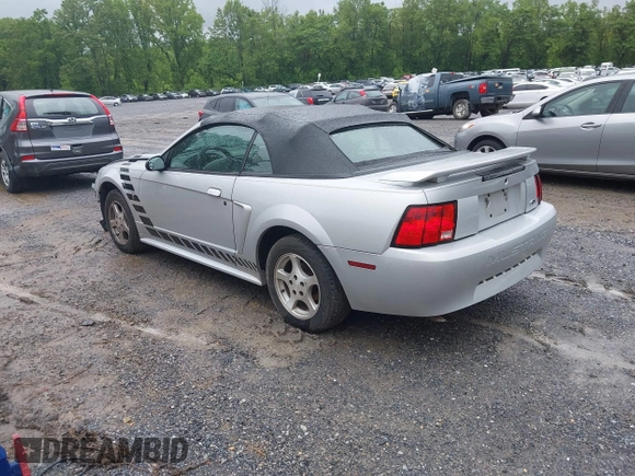 2002 Ford Mustang Deluxe z VIN 1FAFP44492F221578, wystawiony jako IAAI lot #42242232 z przebiegiem 107 773 mil mil oraz . Historia ofert i sprzedaży dostępna na DreamBid. Obrazek 3.