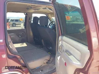 1999 Chevrolet Tahoe Z71 with VIN 1GNEK13R4XJ341736, listed as a IAAI auction lot 42218712 with 282,663 mi miles and . Bid and sale history available at DreamBid. Image 8.