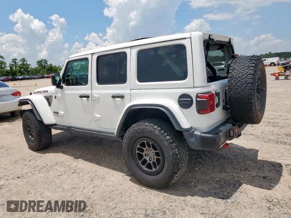 2021 Jeep Wrangler Unlimited Rubicon with VIN 1C4JJXFG1MW849460, listed as a Copart auction lot 62701895 with 54,517 mi miles and Salvage title. Bid and sale history available at DreamBid. Image 2.