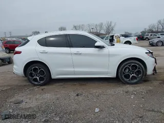 2020 Alfa Romeo Stelvio Ti with VIN ZASPAKBN6L7C92398, listed as a IAAI auction lot 41924883 with 73,683 mi miles. Bid and sale history available at carsss.com. Image 13.
