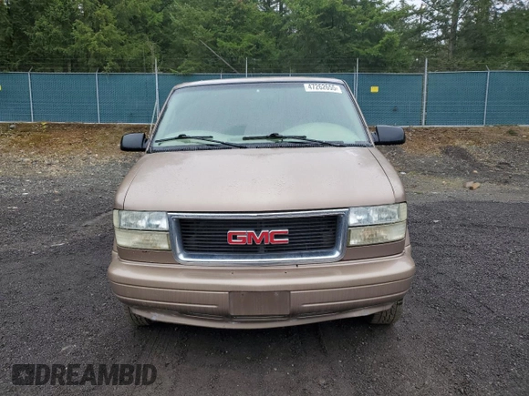 2003 GMC Safari z VIN 1GKEL19X43B503725, wystawiony jako Copart lot #47262655 z przebiegiem 208 200 mil mil oraz Szkody całkowita. Historia ofert i sprzedaży dostępna na DreamBid. Obrazek 5.