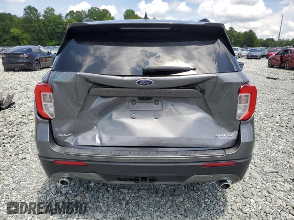 2022 Ford Explorer XLT с VIN 1FMSK8DH2NGB73000, выставлен на аукционе Copart как лот 59864725 с пробегом 57 507 миль миль и Списание • Salvage title. История ставок и продаж доступна на DreamBid. Изображение 6.