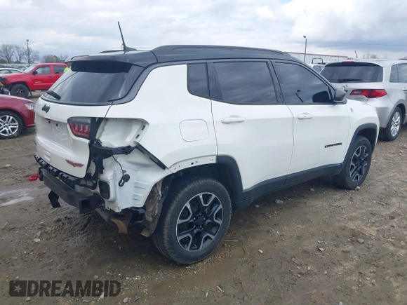 2019 Jeep Compass Trailhawk with VIN 3C4NJDDB0KT733175, listed as a IAAI auction lot 41724527 with 82,574 mi miles and . Bid and sale history available at carsss.com. Image 4.
