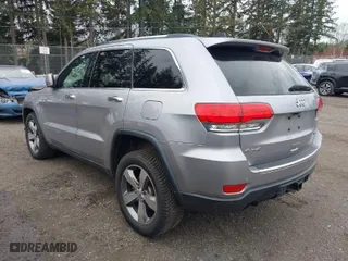 2014 Jeep Grand Cherokee Limited with VIN 1C4RJFBG8EC541921, listed as a IAAI auction lot 41903574 with 133,679 mi miles. Bid and sale history available at carsss.com. Image 3.