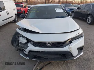 2023 Honda Civic Sport z VIN 19XFL2H89PE021616, wystawiony jako IAAI lot #41771095 z przebiegiem 18 907 mil mil oraz . Historia ofert i sprzedaży dostępna na DreamBid. Obrazek 12.