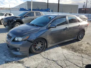 2009 Toyota Corolla XRS with VIN 1NXBE40E59Z136994, listed as a Copart auction lot 87711105 with 114,254 mi miles and Salvage Title. Bid and sale history available at carsss.com. Image 1.