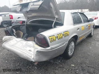 2007 Mercury Grand Marquis LS with VIN 2MEFM75V77X637957, listed as a IAAI auction lot 41520607 with 168,313 mi miles. Bid and sale history available at carsss.com. Image 4.