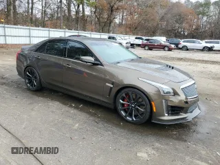 2019 Cadillac CTS-V z VIN 1G6A15S67K0135319, wystawiony jako Copart lot #85065274 z przebiegiem 20 747 mil mil oraz Szkody całkowita. Historia ofert i sprzedaży dostępna na DreamBid. Obrazek 4.