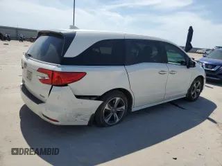 2019 Honda Odyssey Touring with VIN 5FNRL6H86KB089055, listed as a Copart auction lot 56980975 with 154,842 mi miles and Salvage title. Bid and sale history available at DreamBid. Image 3.