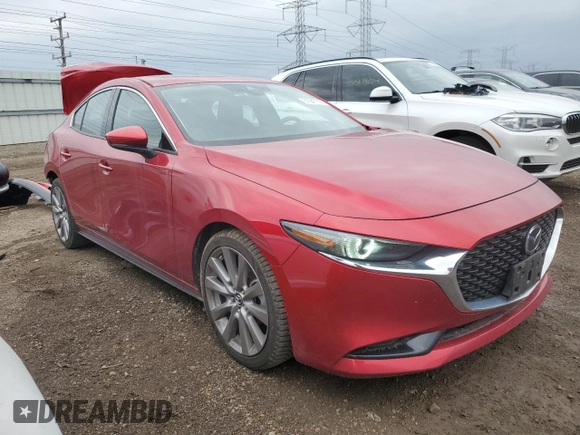 2019 Mazda 3 Premium with VIN 3MZBPAEM6KM103409, listed as a Copart auction lot 51947795 with 100,986 mi miles and Salvage Title. Bid and sale history available at DreamBid. Image 4.