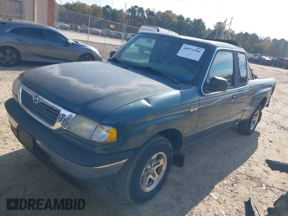 1998 Mazda B-Series Truck DS z VIN 4F4YR16U2WTM42236, wystawiony jako IAAI lot #40971584 z przebiegiem 143 503 mil mil oraz . Historia ofert i sprzedaży dostępna na DreamBid. Obrazek 2.