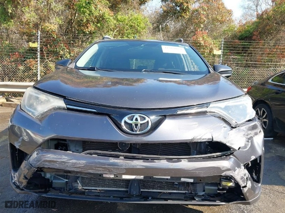 2016 Toyota RAV4 LE with VIN 2T3ZFREV7GW305998, listed as a IAAI auction lot 41869024 with 163,463 mi miles. Bid and sale history available at carsss.com. Image 12.