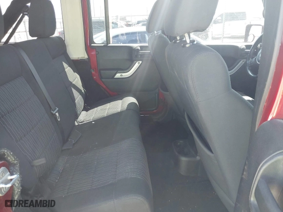 2011 Jeep Wrangler Unlimited Sahara with VIN 1J4BA5H15BL557871, listed as a IAAI auction lot 41922328 with 206,581 mi miles. Bid and sale history available at carsss.com. Image 8.