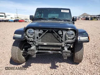 2021 Jeep Wrangler Unlimited Sahara with VIN 1C4JJXP69MW800920, listed as a Copart auction lot 52033745 with 49,173 mi miles and Salvage Title. Bid and sale history available at DreamBid. Image 5.