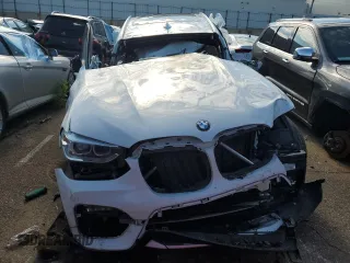 2020 BMW X3 xDrive30i z VIN 5UXTY5C04L9B04359, wystawiony jako Copart lot #58170065 z przebiegiem Nie podano mil oraz Szkoda całkowita • Salvage title. Historia ofert i sprzedaży dostępna na DreamBid. Obrazek 5.