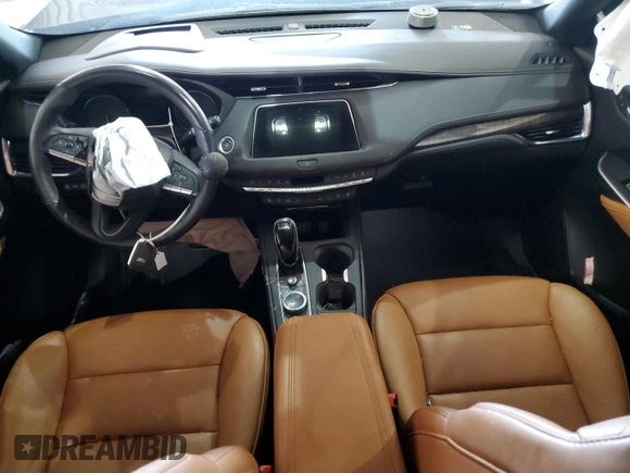 2023 Cadillac XT4 AWD Sport z VIN 1GYFZFR41PF103650, wystawiony jako Copart lot #59321355 z przebiegiem 27 092 mil mil oraz Szkoda całkowita • Salvage title. Historia ofert i sprzedaży dostępna na DreamBid. Obrazek 8.