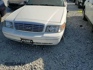 2004 Ford Crown Victoria LX z VIN 2FDFP74W34X164453, wystawiony jako Copart lot #75922204 z przebiegiem 103 546 mil mil oraz Szkoda całkowita • Salvage title. Historia ofert i sprzedaży dostępna na DreamBid. Obrazek 11.