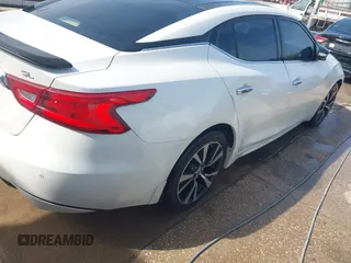 2016 Nissan Maxima SL with VIN 1N4AA6AP5GC383075, listed as a IAAI auction lot 41415505 with 164,392 mi miles and . Bid and sale history available at DreamBid. Image 17.