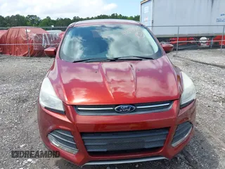 2014 Ford Escape SE z VIN 1FMCU9GX8EUC56018, wystawiony jako IAAI lot #42375937 z przebiegiem 117 341 mil mil oraz . Historia ofert i sprzedaży dostępna na DreamBid. Obrazek 6.